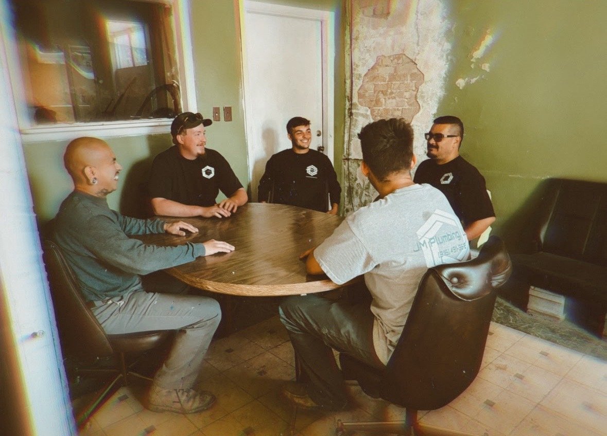 JM Plumbing team meeting